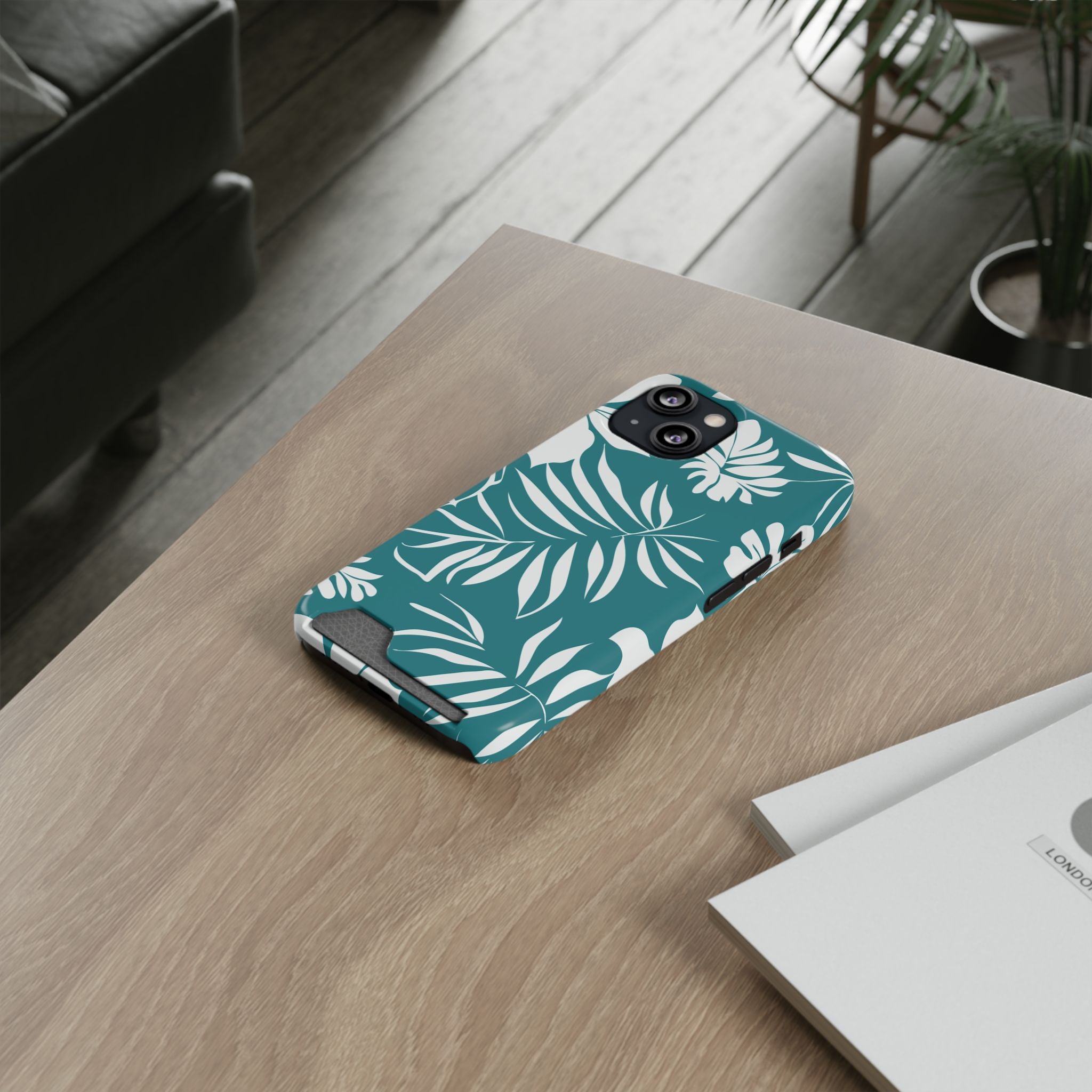 Custodia telefono con porta tessere e design a foglie tropicali color teal